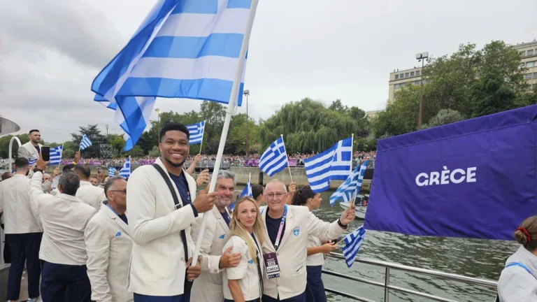 Greece leads athlete parade along Seine at Paris Olympics’ historic opening ceremony