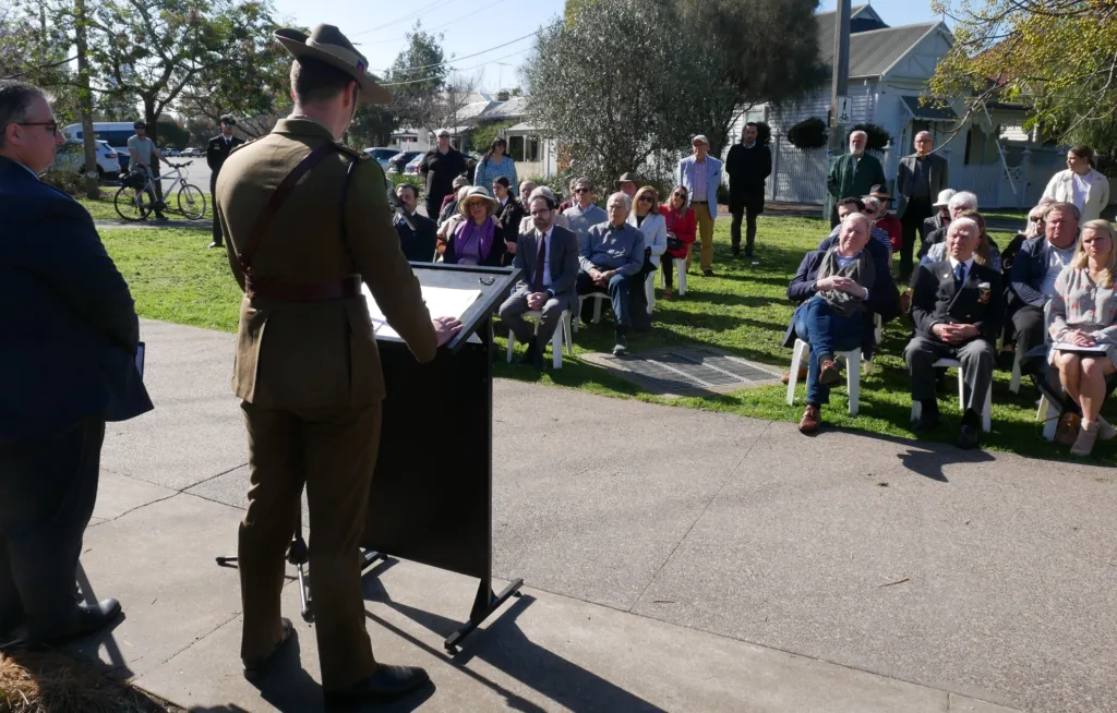 Captain Ryan Curtis addresses the crowd. Photo Jim Claven 2024.