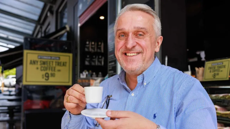 Sydney cafe owner John Christopoulos offers cheap coffee amid cost of living crisis