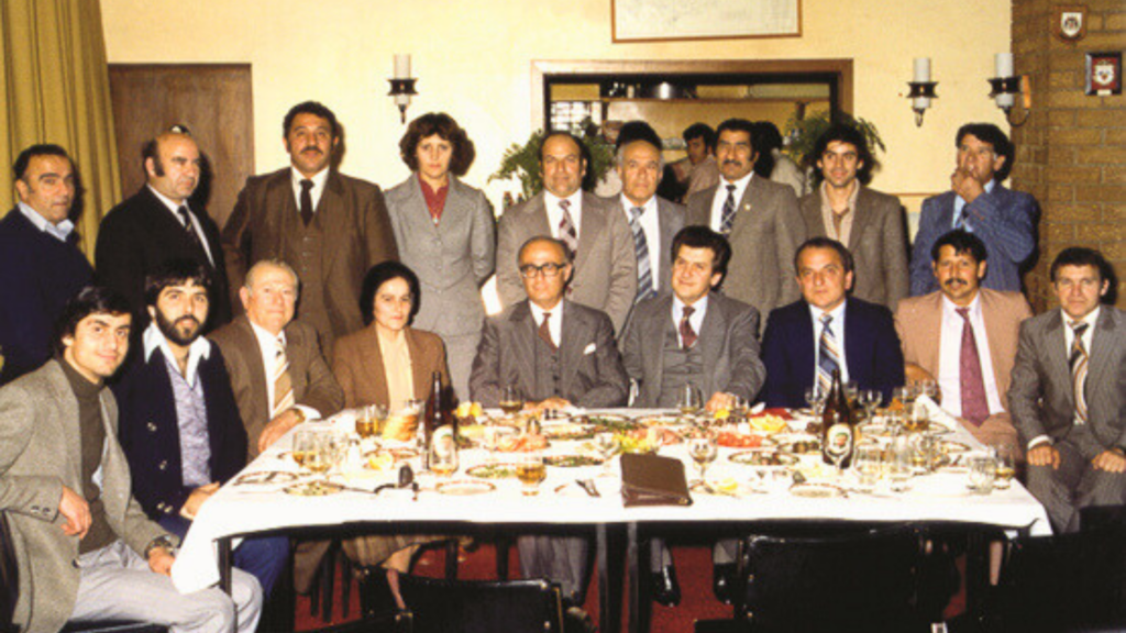 At the premises of Apostolos Andreas Sunshine, a banquet attended by the Board of the CCMV and Sunshine (1981): Front row from left: Solicitor J. Yiannoulatos, M. Sophocleous, P. Yiallouris, H. C. Dr. Procopis Vanezis, P. Yiannoudes, George Pavlides and C. Violaris; Back row from left: Dimitris Koullakas, N. Dymiotis, Dim. Komodromos, Toula Komodromos, G. Nikolaou, Paraskevas Nikola, and  Onesiphoros Georgiou.