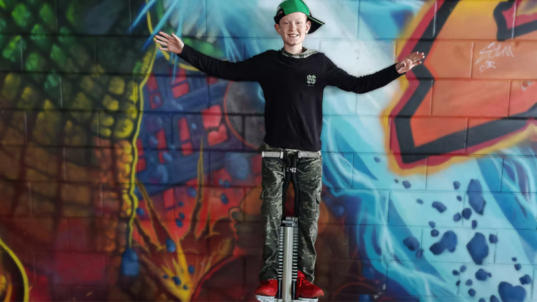 Queensland boy Lachlan Racovalis breaks pogo stick jumping Guinness World Record