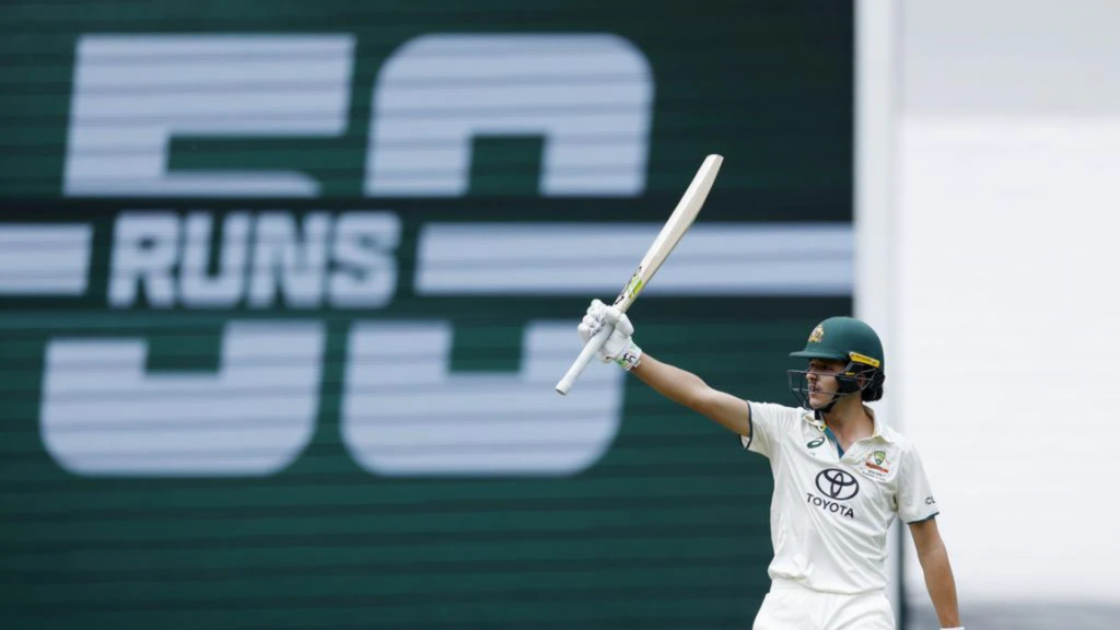 Sam Konstas raises the bat after making 50. Picture: Michael Klein