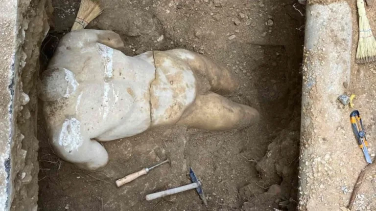 Marble statue unearthed near Acropolis during gas pipe installation