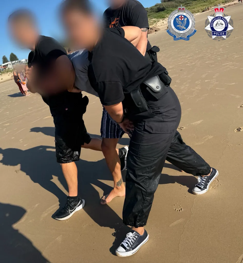 A 30-year-old male Greek national was arrested in the water at Birubi Beach in Anna Bay over his alleged role in a meth import. Photo: Australian Federal Police.