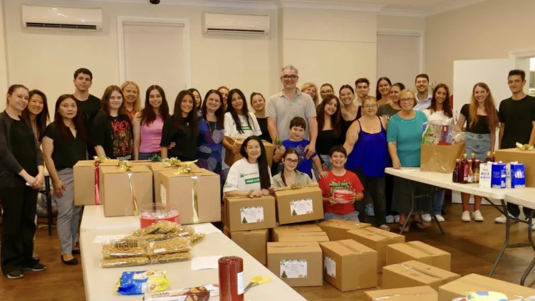 St Nectarios Burwood youth spread Christmas cheer to refugee families