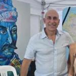 President George Kotsirilos and Vice President Betty Dimitropoulos with Kolokotronis-inspired artworks