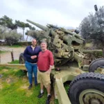 one of the last remaining anti aircraft guns that fought in the Battle of Crete, a Vickers Type. near Chania, with a history enthusiast from Singapore.
