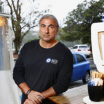 Restaurant owner Peter Papas pushes back on local council speed limit cuts