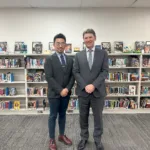 11. Principal Robertson with Guang Wu