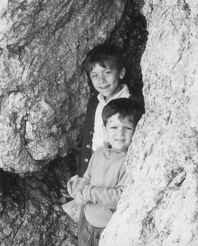 with youngest brother [Petra tou Romiou, 1974]