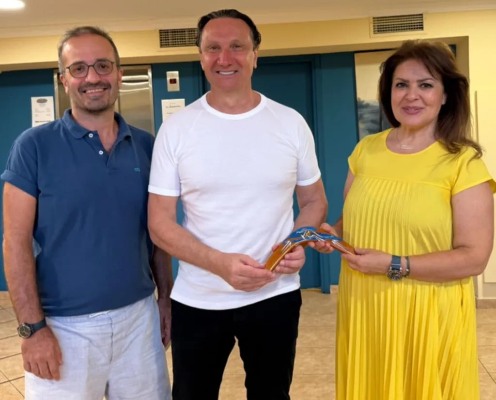 Lefto to right - YMCA of Thessaloniki Yorgos= GCM President Bill Papastergiadis -Maria Papada Foreign Affairs Ministry