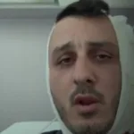 Stav Ben-Shushan, who said a man bit part of his ear off after shouting anti-Israel slogans, on July 26, 2025 in Athens. (Channel 12 screenshot)