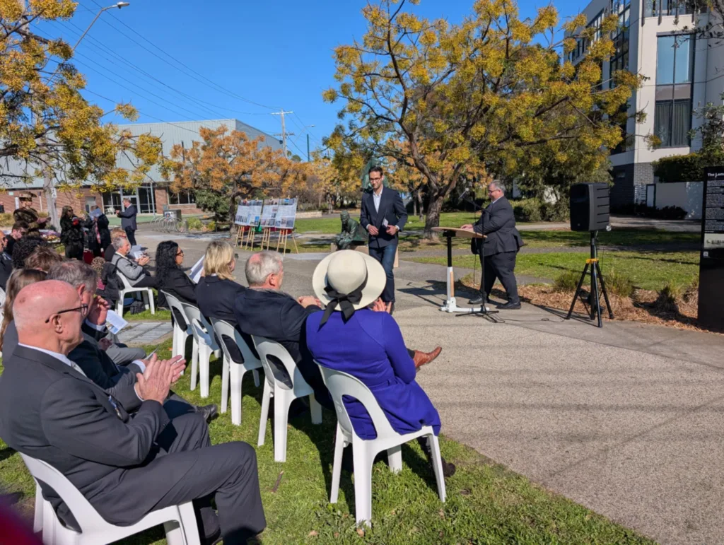 osh Burns MP leaves the podium
