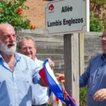 Lambis Englezos (left) next to the street named after him in Fromelles, France.