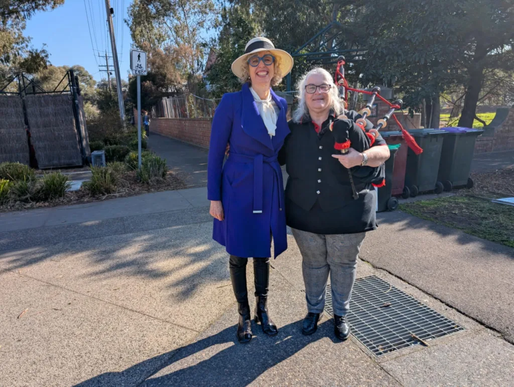 Nina Taylor MP and piper Stacey Harris