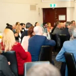 16. Event guests enjoying the keynote speakers