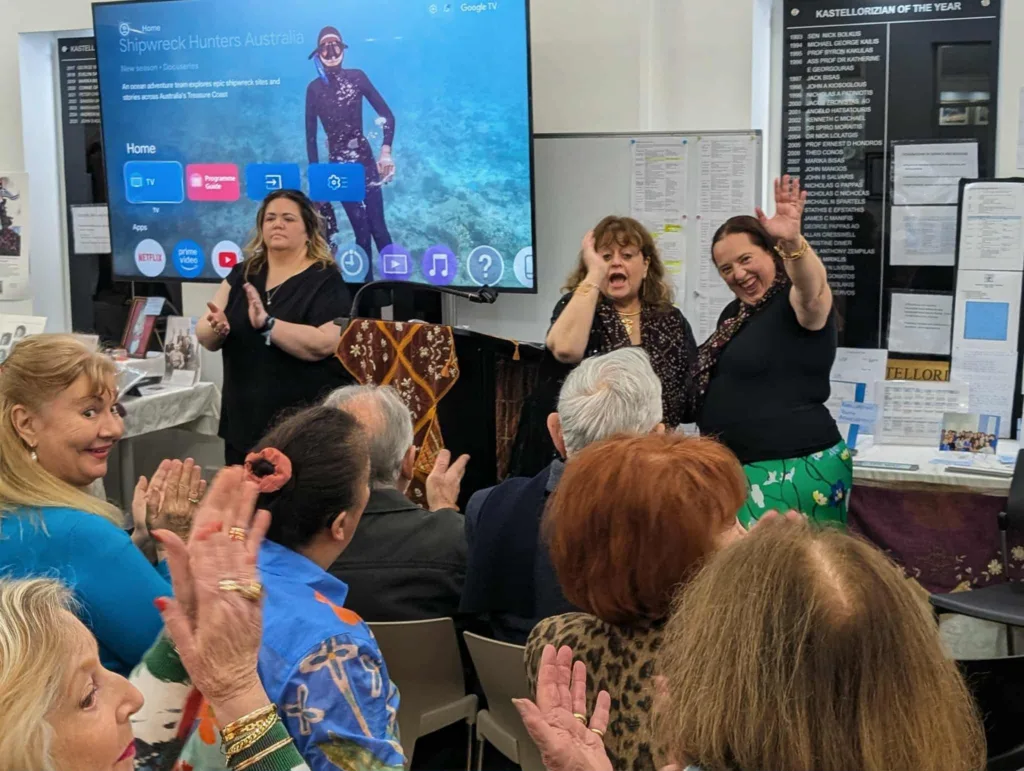 Cheers and claps as Katherine Gekas is about to present the filmk