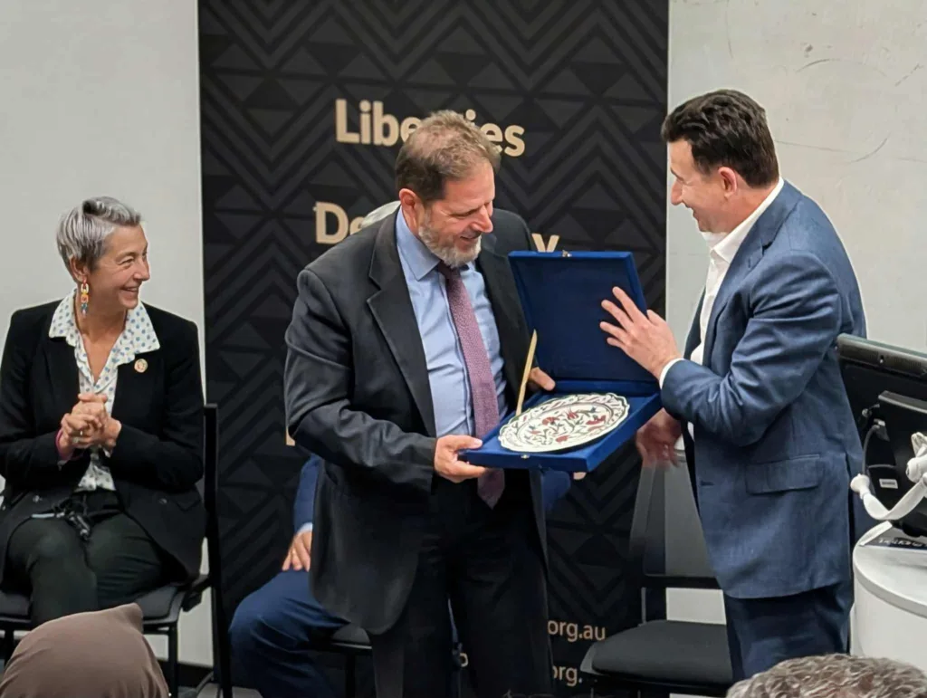Sotirios Livas accepts his gift
