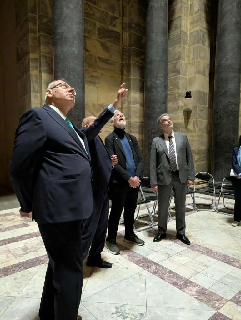 Gazing at the aperture where a beam passes to illuminate the word Love on the Stone of Remembrance at 11am each 11 November
