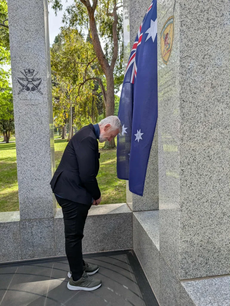 Loverdos bowed to the Australian flag