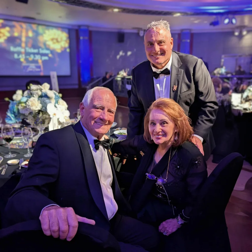 Nik Spartels, with his parents, Michael and Dianne Spartels