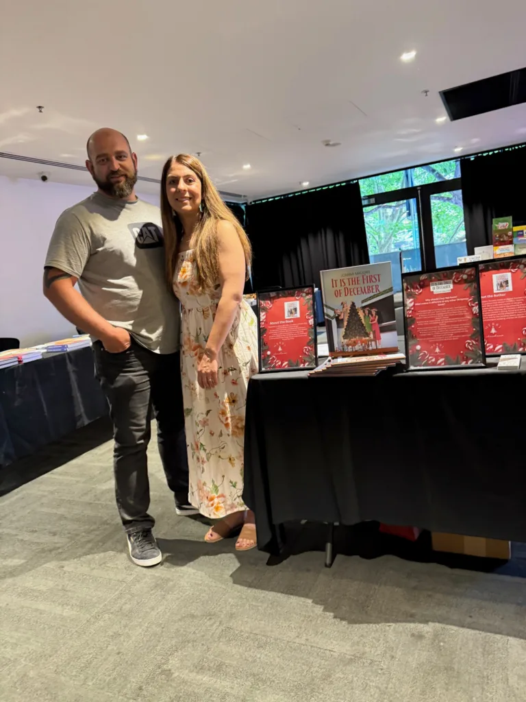 Joanna Malioris with her husband Paul at the Greek Community of Melbourne Book Fair