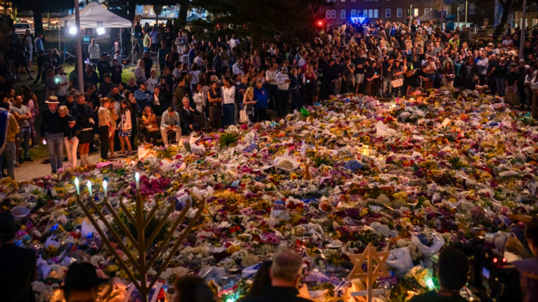 Bondi shooter wakes from coma as Australia mourns victims