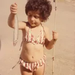 My mum catching a fish on Christmas Day circa 1972