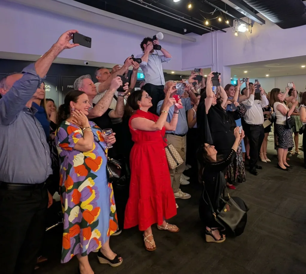 Proud parent paparazzi capturing the moment