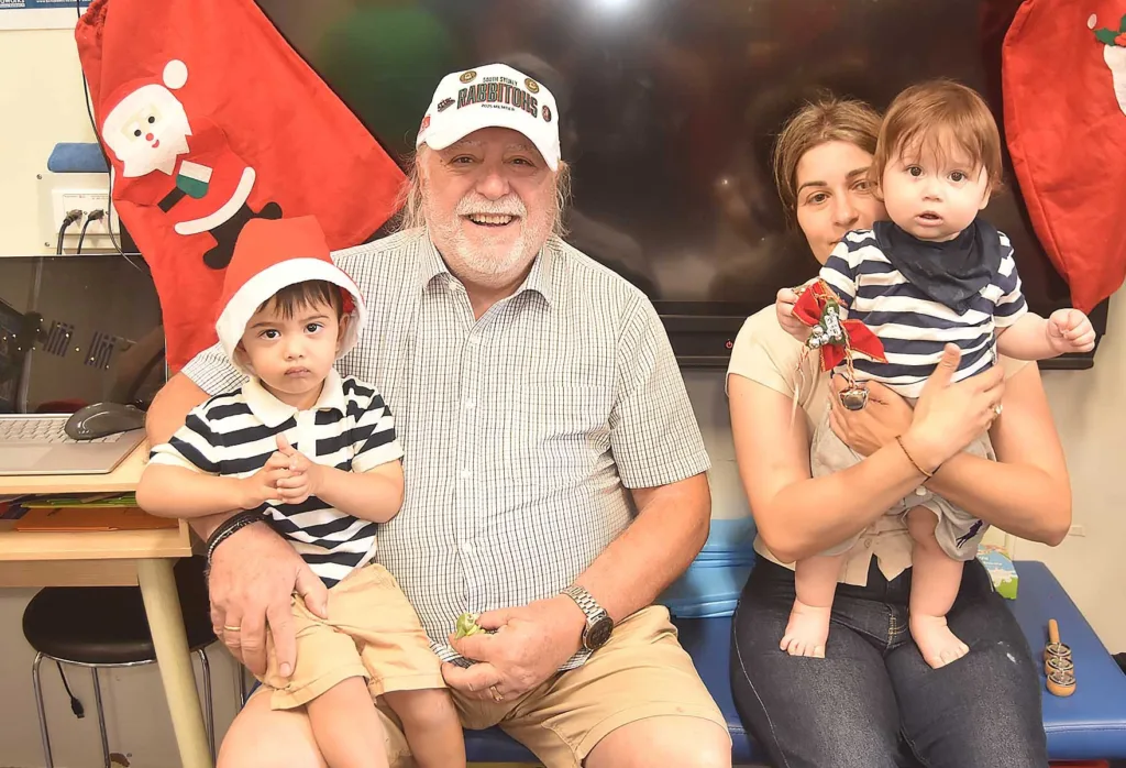 Parents and Grandparents looking on