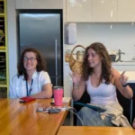 Alphington-Grammar-teacher-Effie-Bindevis-looks-on-as-Demi-shares-ideas-for-guest-list