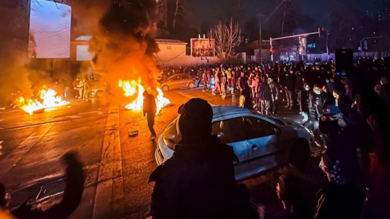 Iran warns of retaliation as protest death toll rises