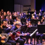 Dimitris Basis and Newtown High School of the Performing Arts students perform ‘Music from the Heart’ in 2024. All photos copyright The Greek Herald, Andriana Simos.