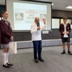 6. Mr Emanuel Comino presenting to Year 12 students and staff