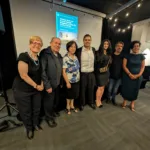 Dr Kritikakos’ family at the book launch, with Dr Joy Damousi