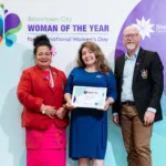 Mayor Brad Bunting and Cr Talia Amituanai congratulate staff Woman of the Year Farideh Bahrami
