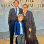 Photo of Chrissa’s son and husband with her on the day she was sworn in as a judge in 2018