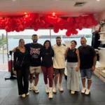 Tia with her family on her gym’s opening night.