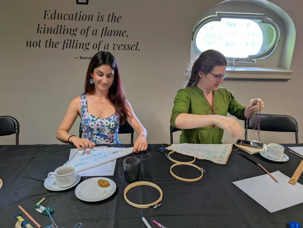 With coffee and paximadakia, workshop attendees recreate their grandmothers' circles