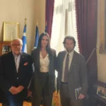 Aliki Chatzara is pictured with Vasileios Konstantinopoulos, President of the Philological Society Parnassos, and Makis Fokas, General Secretary of the Philological Society Parnassos.