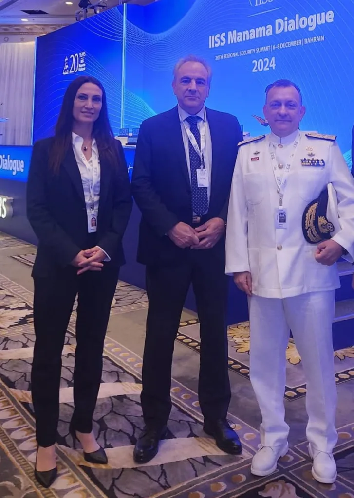 Aliki Chatzara is pictured with Greece’s National Security Advisor, Thanos Dokos, and Rear Admiral Vasileios Gryparis, Commander of the European Operation ASPIDES.