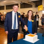 13. Principal Mark Robertson and Arrowsmith Coordinator Helen Gilinas cut the anniversary cake