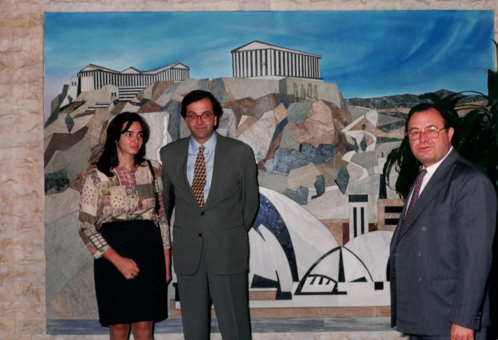 Former Greek Prime Minister Antonis Samaras (centre) and Theo Skalkos at his Glebe offices.
