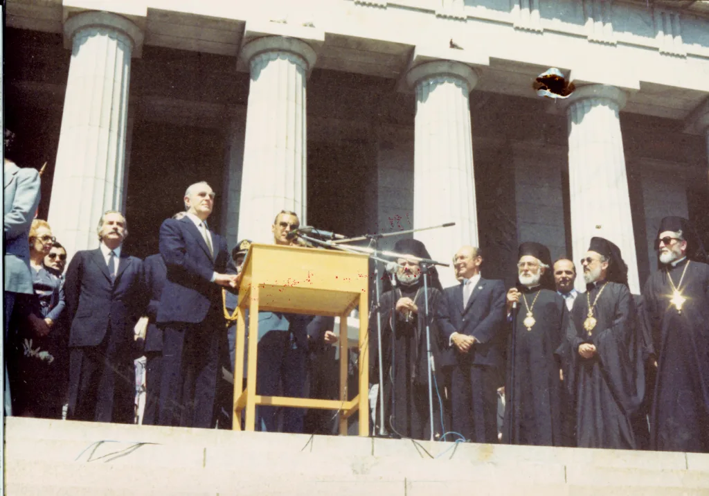 Greek President Konstantinos Karamanlis and Archbishop Stylianos address the Greek-Australian community at Melbourne's Shrine of Remembrance, March 1982.
