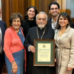 Father Diogenis with Harry Patsouris family.