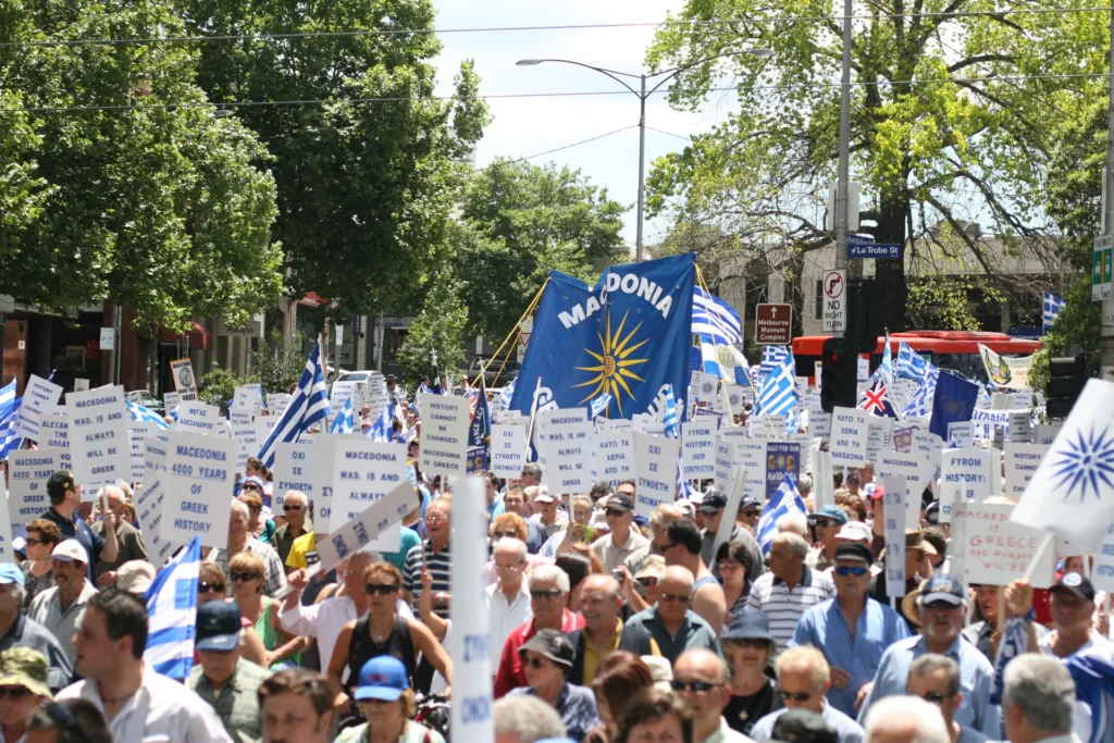 Macedonian_Greek-Australians_rally_in_Melbourne,_people_with_flags_and_signs (1)