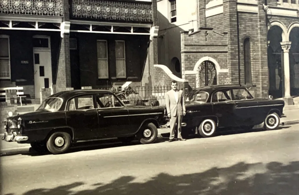Theo Skalkos with his ’52 Holden fleet for his driving school that he rented out for weddings and christenings on weekends.