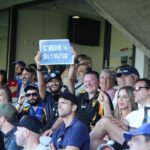 TGH-CUP-FANS-WAVE-SIGNS-PRINTED-IN-THE-GREEK-HERALD-FOR-MATCH-DAY
