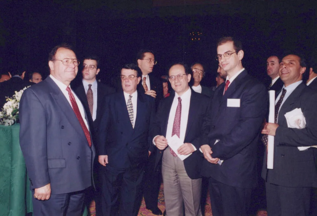 Theo Skalkos with founder of ANT1 group Minos Kyriakou. Right Dr Hass Dellal