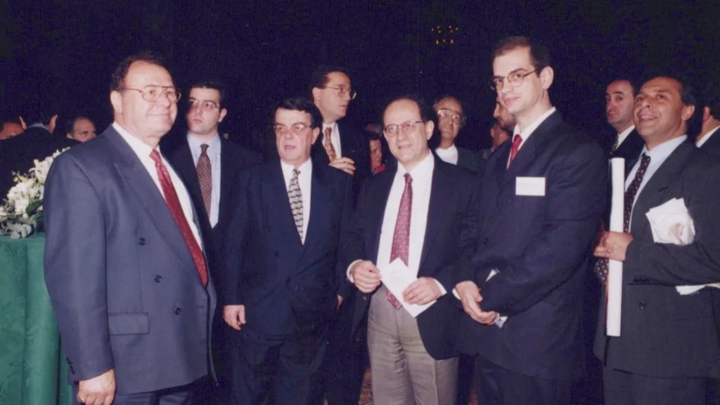 Theo Skalkos with founder of ANT1 group Minos Kyriakou. Right Dr Hass Dellal
